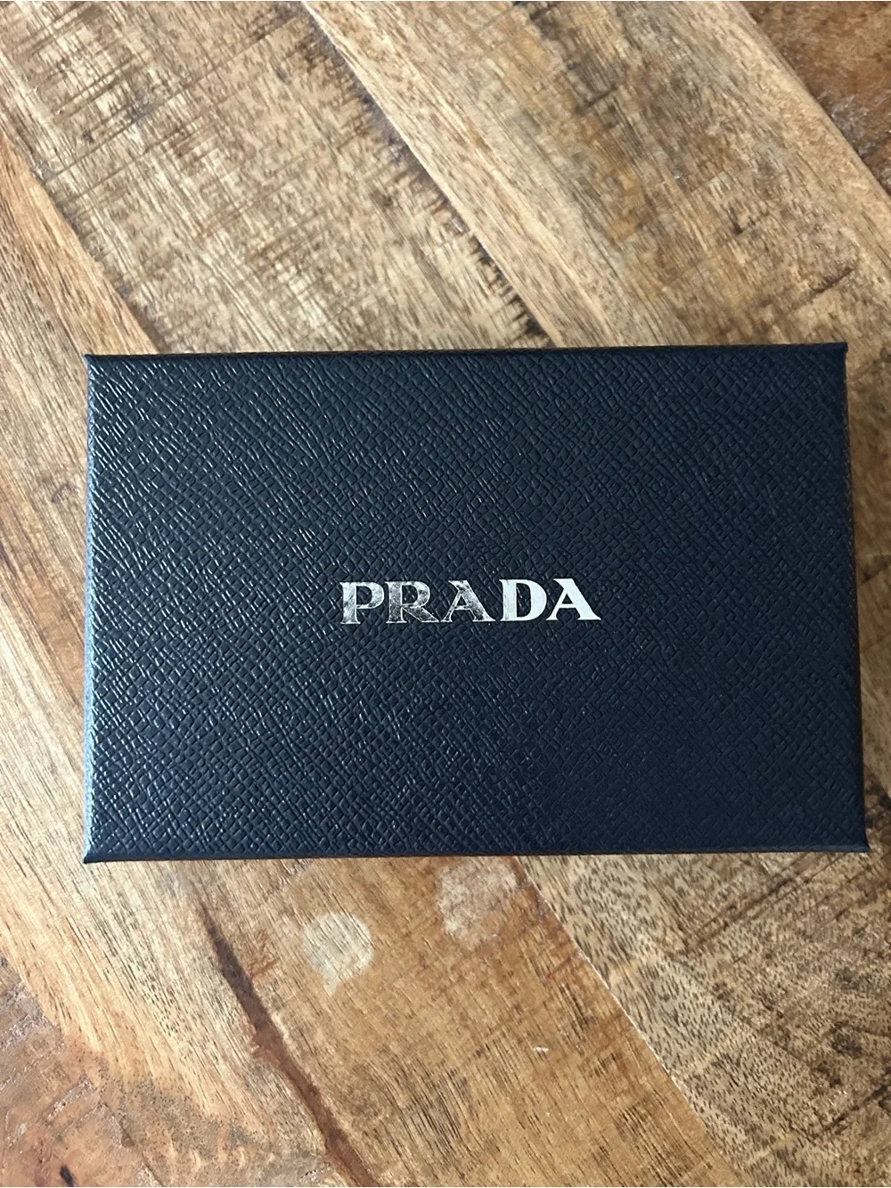 Prada Black Leather Card Holder with Gold Crest